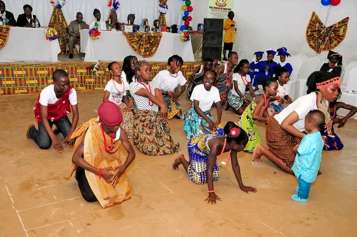 Students writing notes