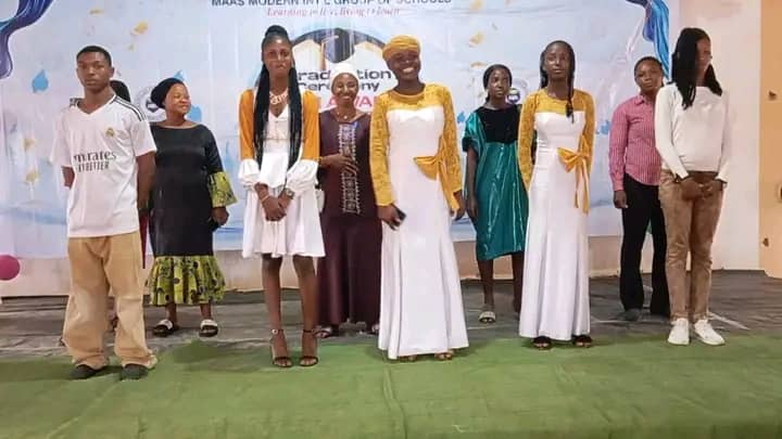 Students writing notes