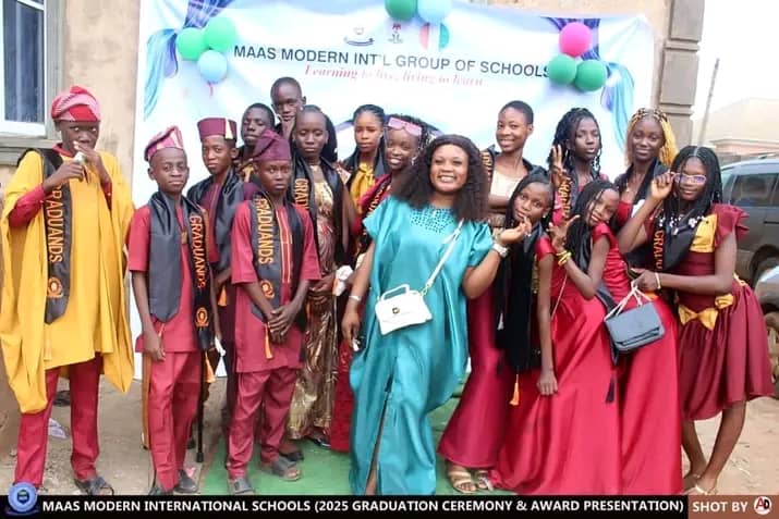 Students writing notes